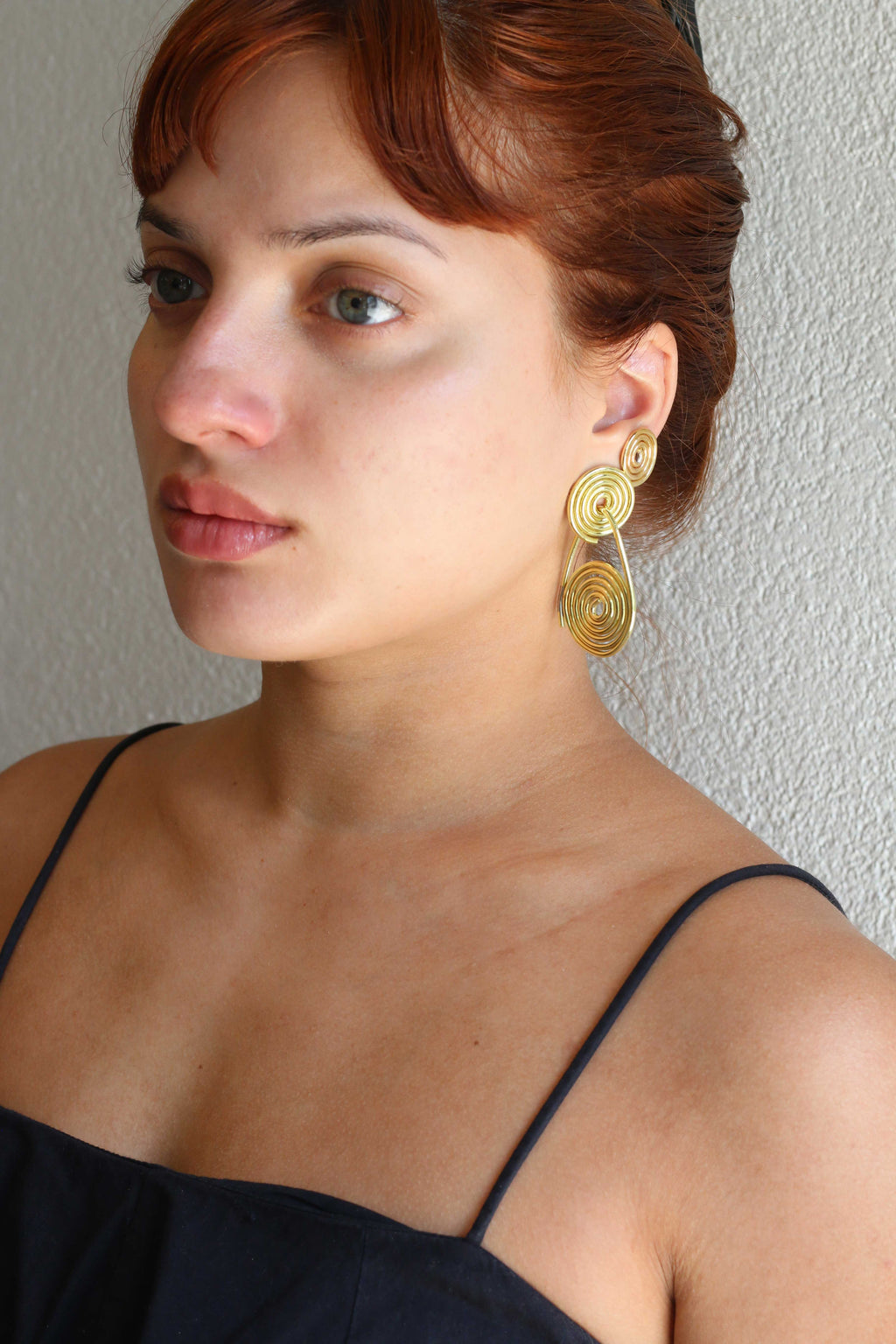 brass swirl dangle earrings